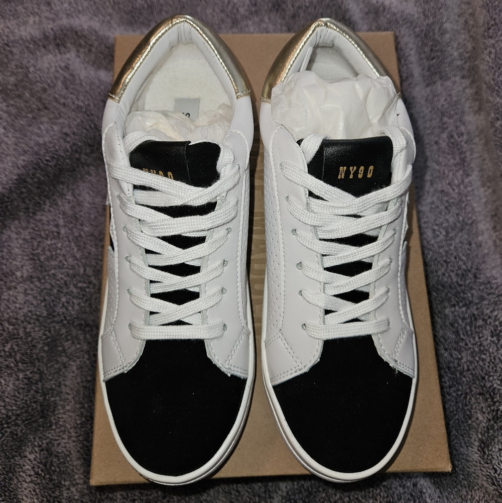 White and Black Sneakers with Gold Accents